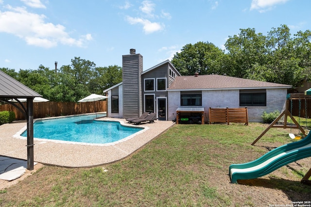 2102 Encino Clf, San Antonio, TX 78259 - view of swimming pool with a playground, a fenced backyard, a patio area, and a gazebo