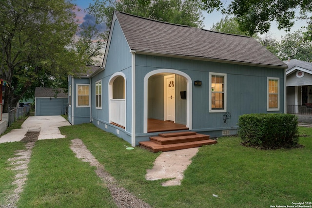 1806 W Mistletoe Ave, San Antonio, TX 78201 - english style home featuring roof with shingles, crawl space, driveway, and an outbuilding