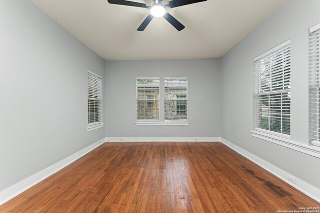 1806 W Mistletoe Ave, San Antonio, TX 78201 - spare room with wood finished floors and a ceiling fan
