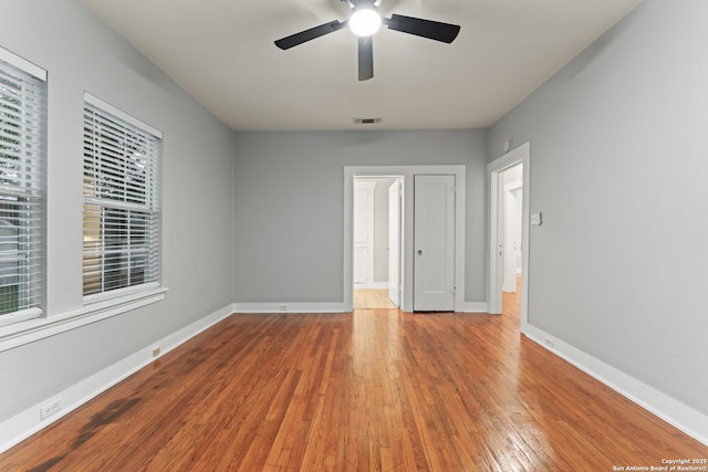 1806 W Mistletoe Ave, San Antonio, TX 78201 - unfurnished room with ceiling fan and wood-type flooring