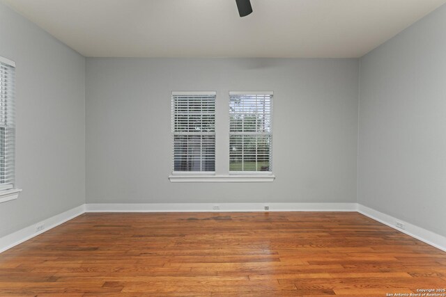 1806 W Mistletoe Ave, San Antonio, TX 78201 - unfurnished room featuring wood finished floors and ceiling fan