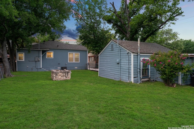 1806 W Mistletoe Ave, San Antonio, TX 78201 - back of house with crawl space, a storage unit, and a shingled roof