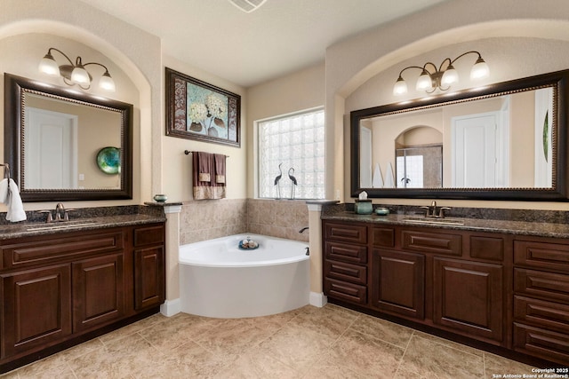 25926 Natal Plum, San Antonio, TX 78261 - bathroom with two vanities and a bath