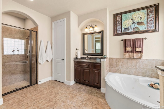 25926 Natal Plum, San Antonio, TX 78261 - full bath with a shower stall, a jetted tub, and vanity