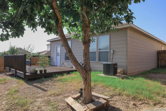 11334 Pink Star, San Antonio, TX 78245 - rear view of house with a wooden deck
