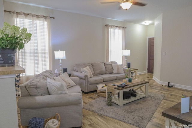11334 Pink Star, San Antonio, TX 78245 - living room featuring a ceiling fan and wood finished floors