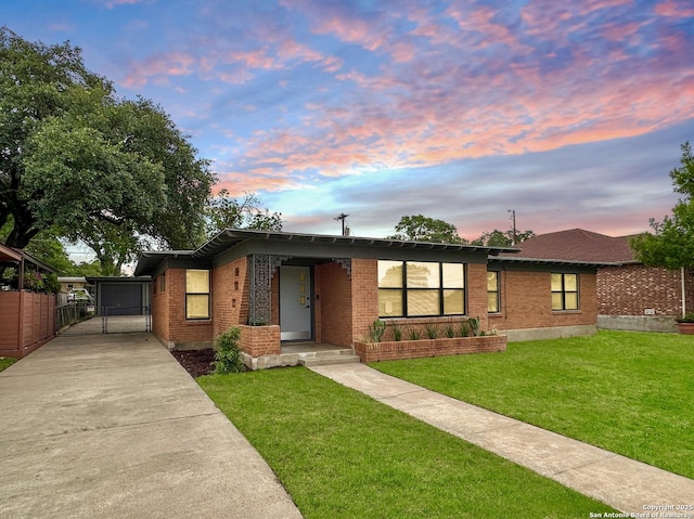 543 Cosgrove, San Antonio, TX 78210 - view of front of property with brick siding, a gate, and a garage