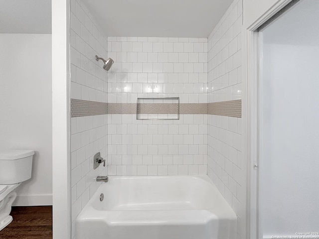 543 Cosgrove, San Antonio, TX 78210 - full bath with washtub / shower combination and wood finished floors