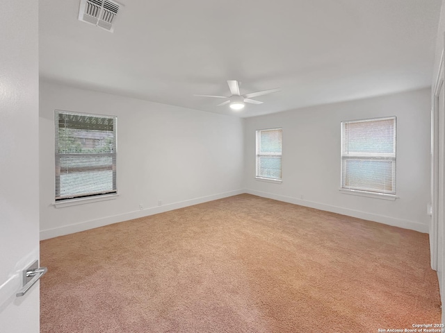 543 Cosgrove, San Antonio, TX 78210 - unfurnished room featuring a ceiling fan and light colored carpet