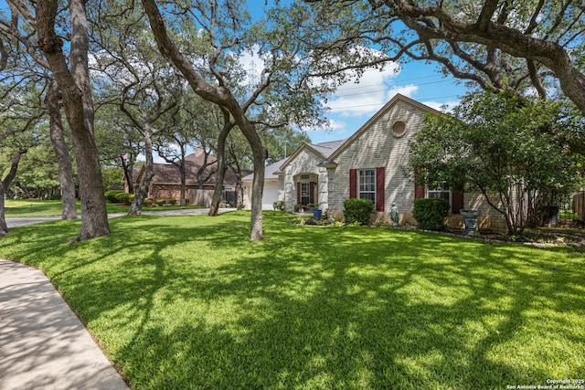 8526 Spartan Ter, Universal City, TX 78148 - view of front of home with a front lawn