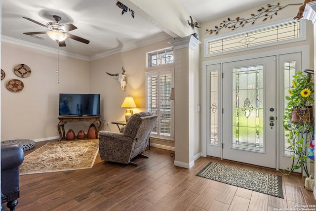 8526 Spartan Ter, Universal City, TX 78148 - entryway with decorative columns, ceiling fan, wood finished floors, and ornamental molding