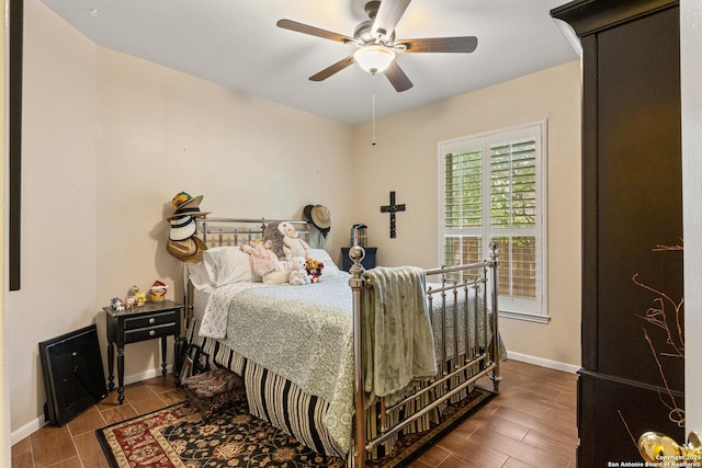8526 Spartan Ter, Universal City, TX 78148 - bedroom featuring ceiling fan and wood finished floors
