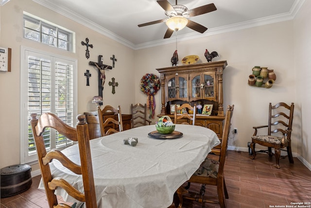 8526 Spartan Ter, Universal City, TX 78148 - dining space with dark wood-style floors, a ceiling fan, and crown molding