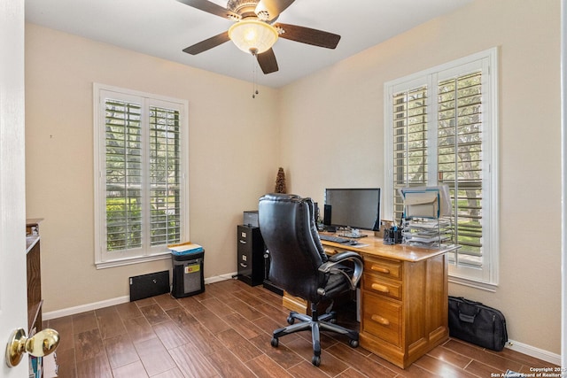8526 Spartan Ter, Universal City, TX 78148 - office space featuring dark wood finished floors and a ceiling fan
