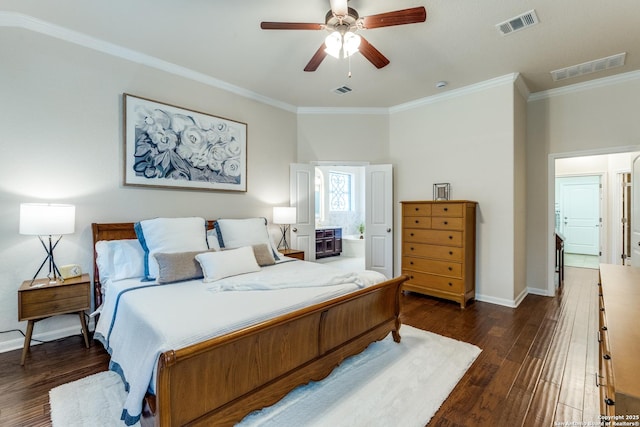 3415 Crest Noche Dr, San Antonio, TX 78261 - bedroom featuring ornamental molding, dark wood-style floors, and a ceiling fan