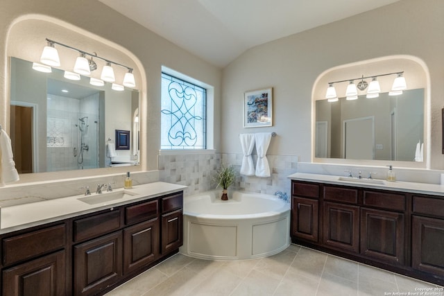 3415 Crest Noche Dr, San Antonio, TX 78261 - full bathroom with a stall shower, two vanities, lofted ceiling, a bath, and tile patterned flooring
