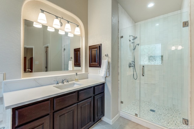 3415 Crest Noche Dr, San Antonio, TX 78261 - full bath with a stall shower, vanity, and tile patterned floors