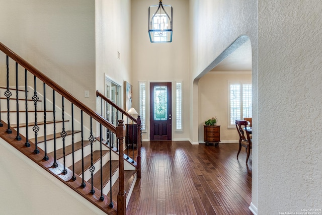 3415 Crest Noche Dr, San Antonio, TX 78261 - entrance foyer with a textured wall, plenty of natural light, hardwood / wood-style floors, crown molding, and stairway