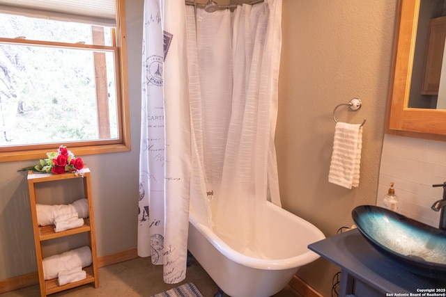 317 Saddle Mtn, Boerne, TX 78006 - full bathroom with a sink and baseboards