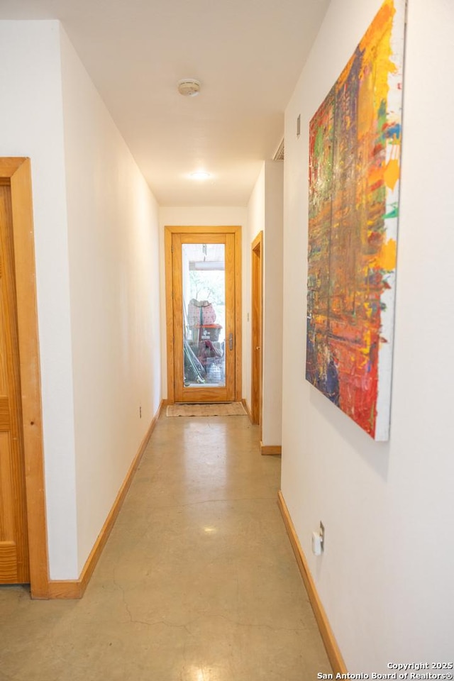 317 Saddle Mtn, Boerne, TX 78006 - hallway featuring baseboards and finished concrete flooring