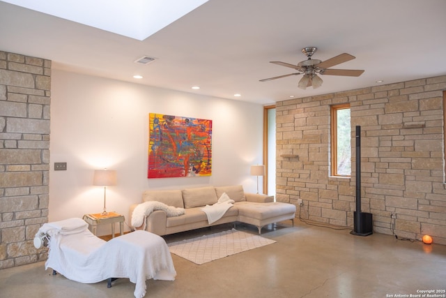 317 Saddle Mtn, Boerne, TX 78006 - living area featuring concrete flooring, a ceiling fan, and recessed lighting