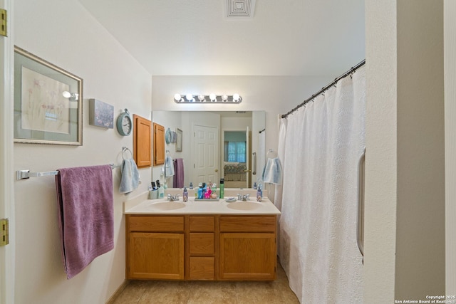 5327 Stormy Skies, San Antonio, TX 78247 - bathroom featuring double vanity and a shower with curtain