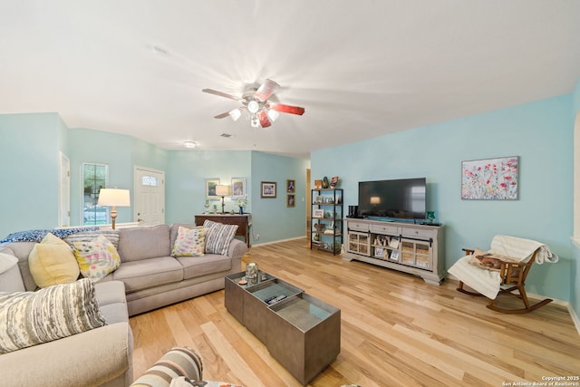 5327 Stormy Skies, San Antonio, TX 78247 - living area featuring wood finished floors and a ceiling fan
