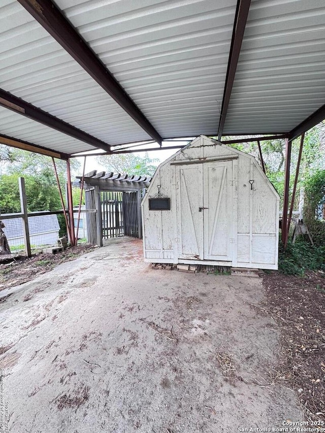 323 N Scenic Loop, Canyon Lake, TX 78133 - view of shed featuring a pergola