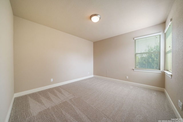 1702 Terra Alta, San Antonio, TX 78209 - spare room with carpet floors and baseboards