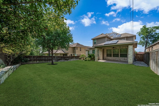 1702 Terra Alta, San Antonio, TX 78209 - fenced backyard featuring a ceiling fan and a patio