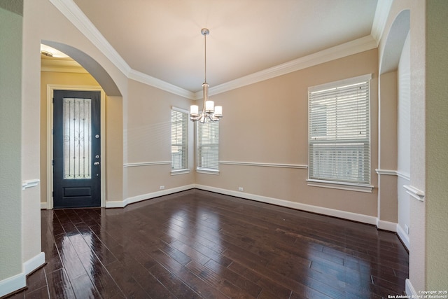 1702 Terra Alta, San Antonio, TX 78209 - spare room with a chandelier, ornamental molding, hardwood / wood-style flooring, and arched walkways