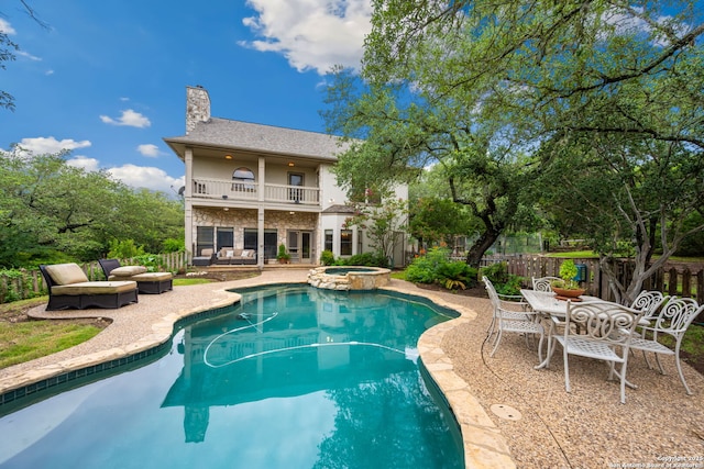 7 Mcinnis, Bulverde, TX 78163 - view of pool featuring a patio area, a pool with connected hot tub, and outdoor lounge area