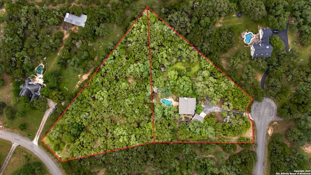 7 Mcinnis, Bulverde, TX 78163 - aerial view of property and surrounding area featuring property parcel outlined