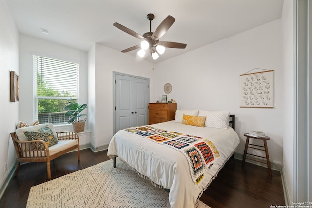 8903 Gate Pass, Boerne, TX 78015 - bedroom featuring wood-type flooring, a closet, and a ceiling fan