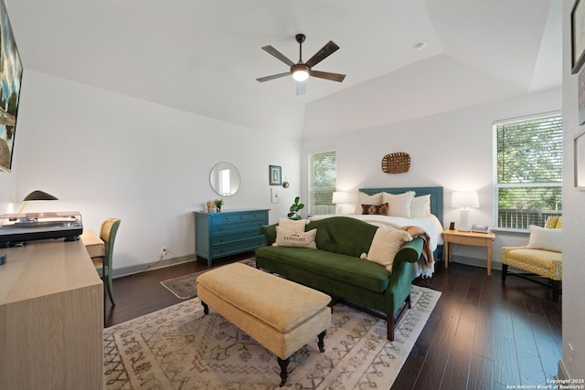 8903 Gate Pass, Boerne, TX 78015 - bedroom with multiple windows, vaulted ceiling, a ceiling fan, and wood finished floors