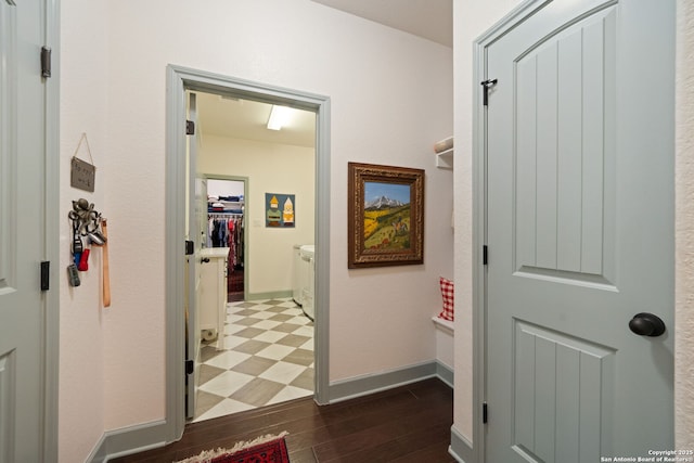 8903 Gate Pass, Boerne, TX 78015 - hall featuring dark wood finished floors and baseboards