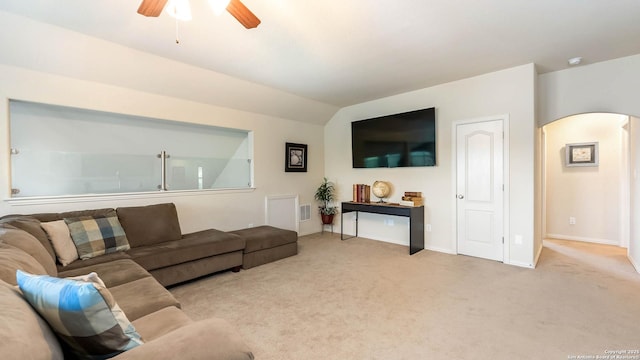 24514 Bliss Cyn, San Antonio, TX 78260 - carpeted living area with arched walkways, a ceiling fan, and vaulted ceiling