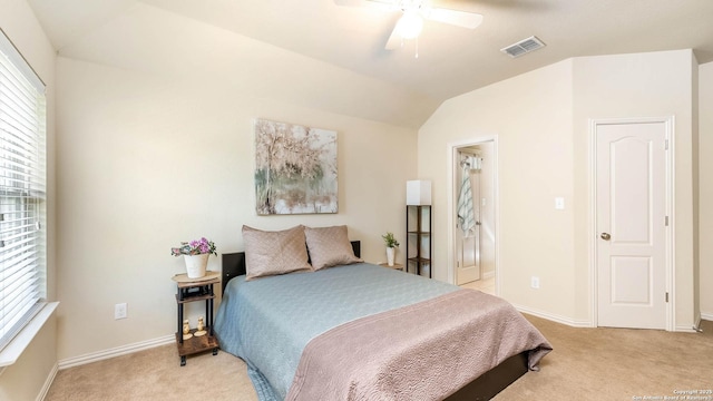 24514 Bliss Cyn, San Antonio, TX 78260 - bedroom featuring light carpet, multiple windows, lofted ceiling, and a ceiling fan