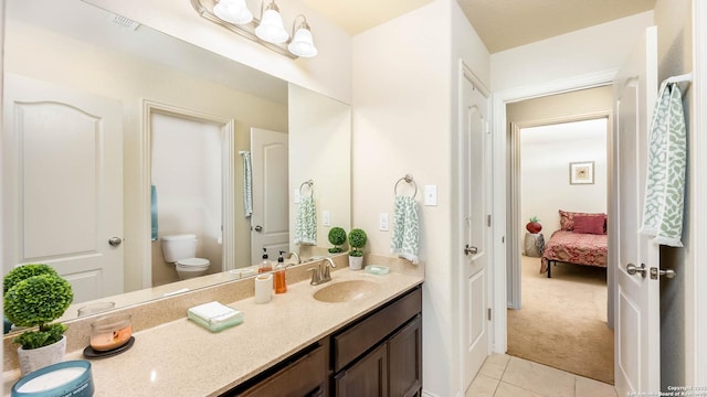 24514 Bliss Cyn, San Antonio, TX 78260 - bathroom featuring tile patterned floors, vanity, and ensuite bath