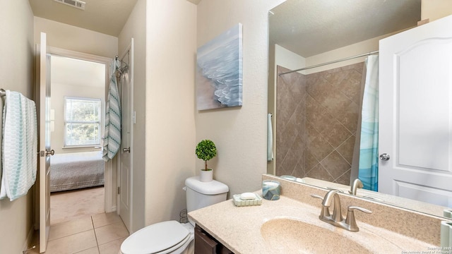 24514 Bliss Cyn, San Antonio, TX 78260 - ensuite bathroom featuring vanity, tile patterned flooring, and a shower with curtain