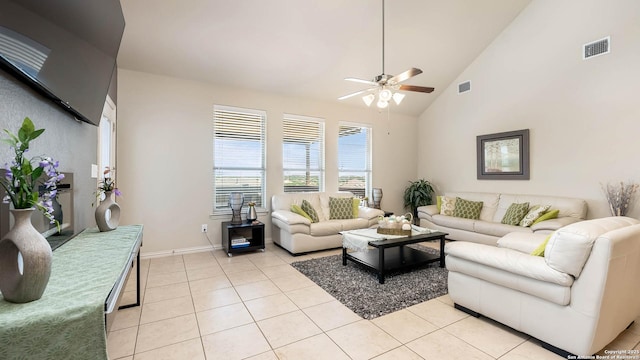 24514 Bliss Cyn, San Antonio, TX 78260 - living room with a ceiling fan, light tile patterned floors, and lofted ceiling