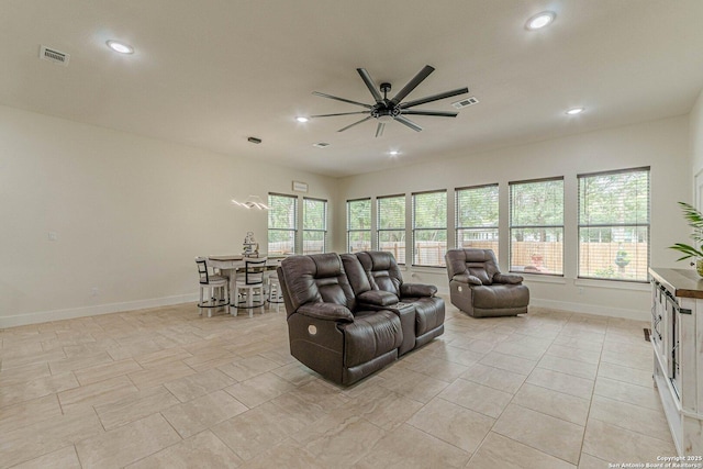 114 Mokukua Ln, Bastrop, TX 78602 - living area featuring healthy amount of natural light, recessed lighting, a ceiling fan, and light tile patterned floors