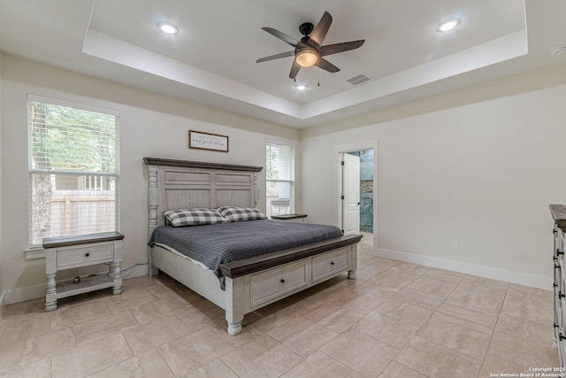 114 Mokukua Ln, Bastrop, TX 78602 - bedroom with a raised ceiling, recessed lighting, and a ceiling fan