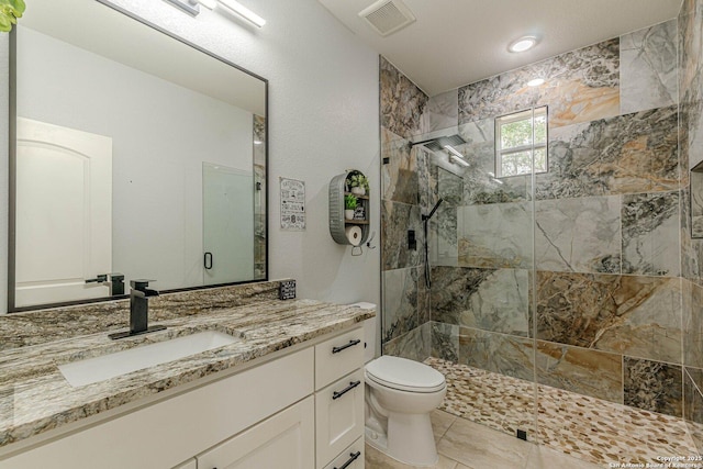 114 Mokukua Ln, Bastrop, TX 78602 - bathroom featuring walk in shower and vanity