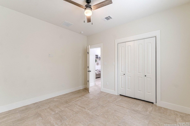114 Mokukua Ln, Bastrop, TX 78602 - unfurnished bedroom featuring a closet and ceiling fan