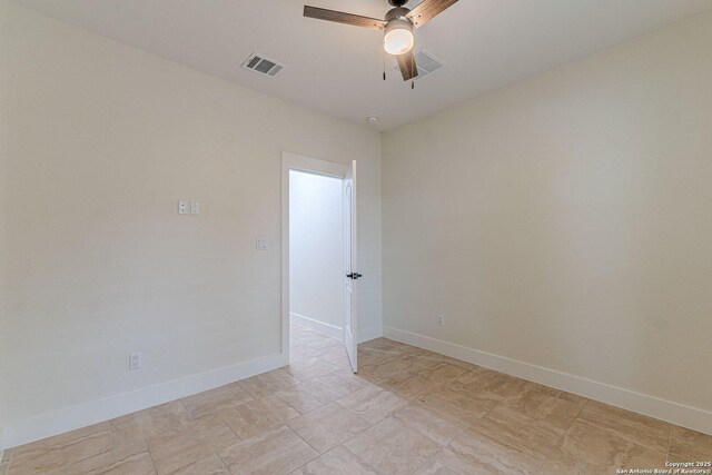 114 Mokukua Ln, Bastrop, TX 78602 - spare room featuring a ceiling fan and baseboards