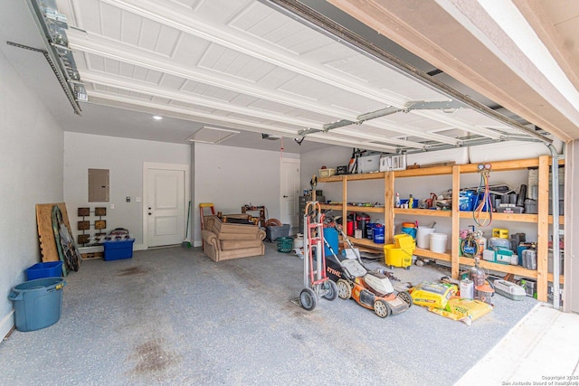 114 Mokukua Ln, Bastrop, TX 78602 - garage featuring electric panel and a garage door opener