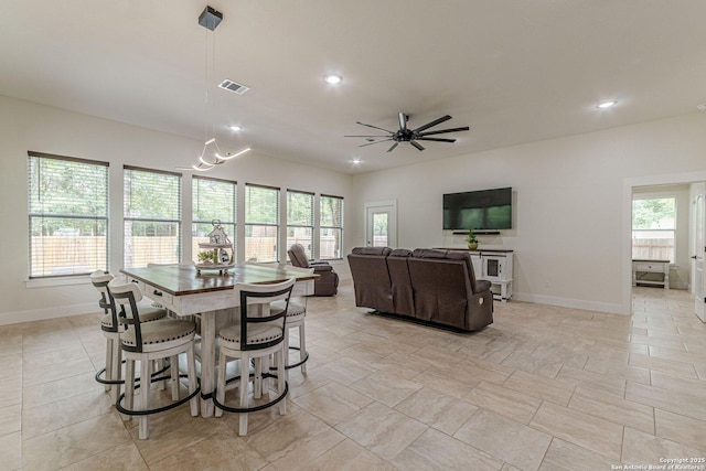 114 Mokukua Ln, Bastrop, TX 78602 - dining space with recessed lighting, ceiling fan, and a chandelier