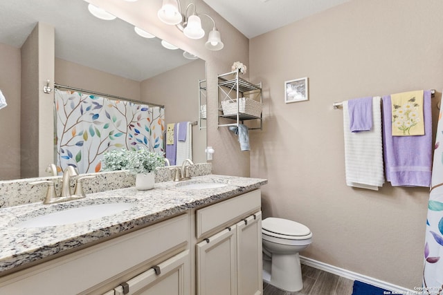 27306 Pollock, San Antonio, TX 78260 - bathroom with double vanity, wood finished floors, and curtained shower