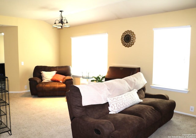 9522 Sage Ter, San Antonio, TX 78251 - carpeted living area with a chandelier and baseboards